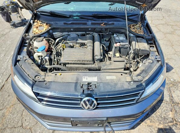 3VW2B7AJ8JM220730 2018 VOLKSWAGEN JETTA Gray Vista interior trasera