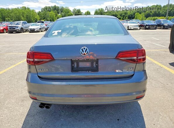 3VW2B7AJ9JM220686 2018 VOLKSWAGEN JETTA Gray Vista trasera