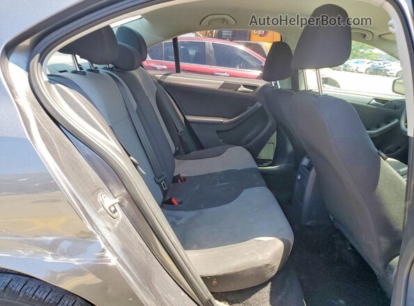 3VW2B7AJ9JM220686 2018 VOLKSWAGEN JETTA Gray Vista de los asientos traseros