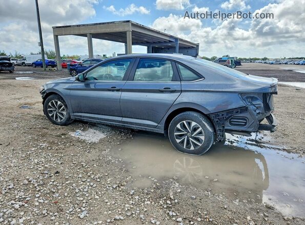 3VW4M7BU7PM005408 2023 VOLKSWAGEN JETTA Gray Trasero izquierdo