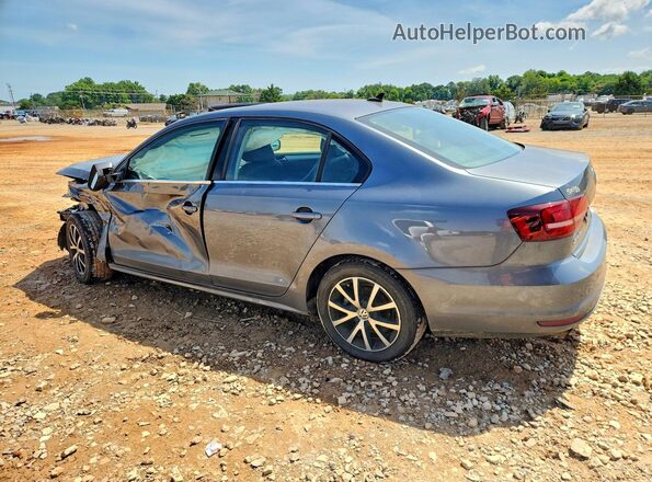 3VWB67AJ6HM298549 2017 VOLKSWAGEN JETTA Charcoal Tył lewy