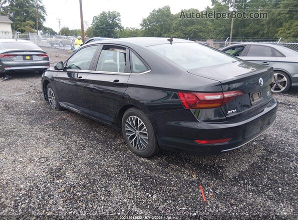 3VWC57BU1KM068313 2019 VOLKSWAGEN JETTA Black Trasero izquierdo