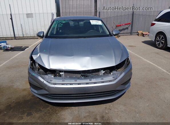 3VWC57BU3KM198772 2019 VOLKSWAGEN JETTA Серебряный Вид задней части салона