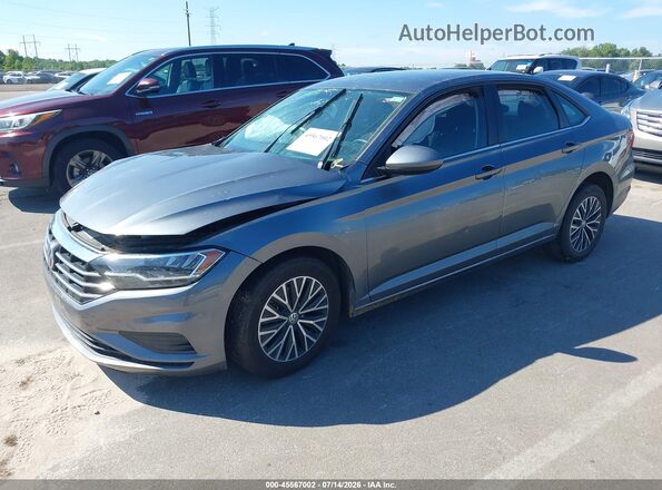 3VWC57BU5MM090446 2021 VOLKSWAGEN JETTA Gray Vista tres cuartos delantera izquierda