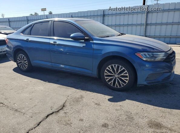 3VWC57BU6KM051104 2019 VOLKSWAGEN JETTA Синий Передняя правая четверть