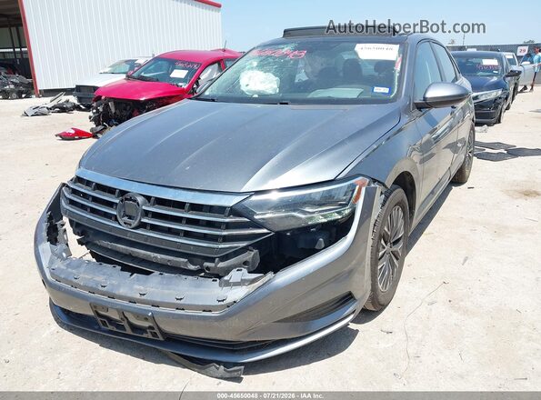 3VWC57BU6KM220988 2019 VOLKSWAGEN JETTA Gray Vista tres cuartos delantera izquierda