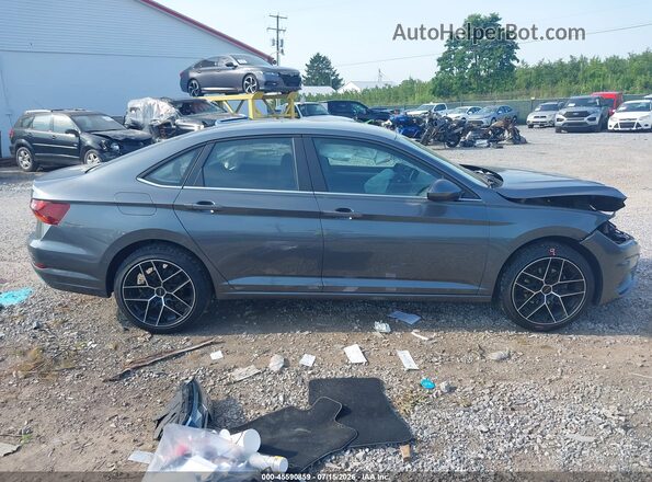 3VWC57BU7KM065349 2019 VOLKSWAGEN JETTA Серый Вид задней части салона
