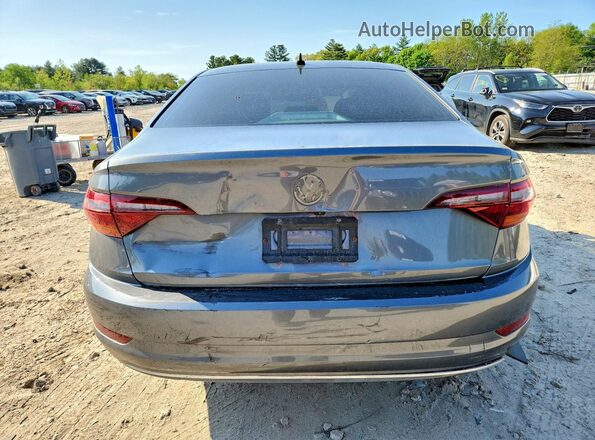 3VWC57BU7KM144195 2019 VOLKSWAGEN JETTA Серый Вид сзади