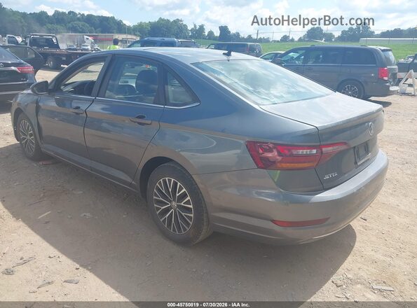 3VWC57BU8KM086503 2019 VOLKSWAGEN JETTA Gray Trasero izquierdo