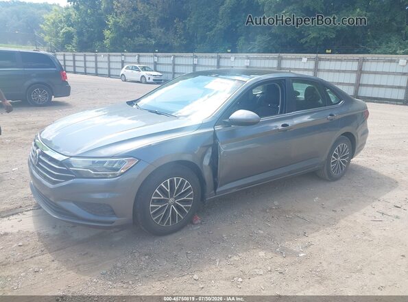 3VWC57BU8KM086503 2019 VOLKSWAGEN JETTA Gray Vista tres cuartos delantera izquierda