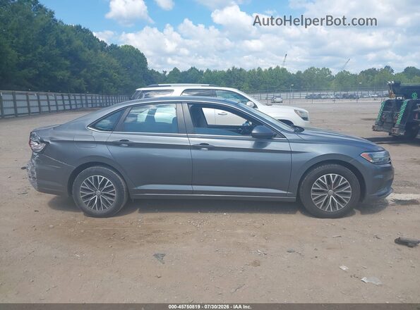 3VWC57BU8KM086503 2019 VOLKSWAGEN JETTA Gray Vista interior trasera