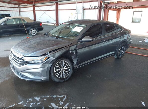 3VWC57BU9MM035806 2021 VOLKSWAGEN JETTA Gray Vista tres cuartos delantera izquierda