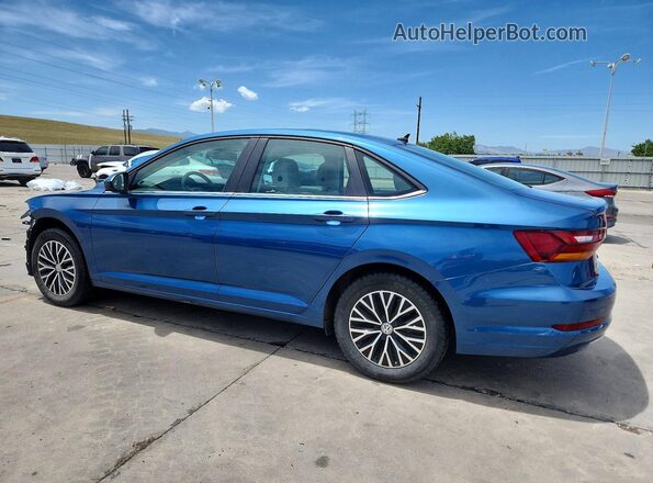 3VWC57BUXKM201165 2019 VOLKSWAGEN JETTA Blue Tył lewy