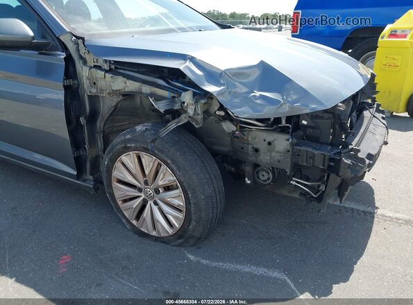 3VWC57BUXKM253038 2019 VOLKSWAGEN JETTA Gray Вид спереду