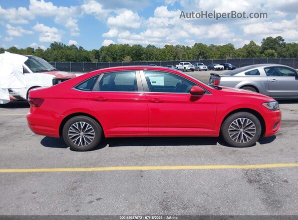 3VWCB7BUXKM169052 2019 VOLKSWAGEN JETTA Красный Вид задней части салона