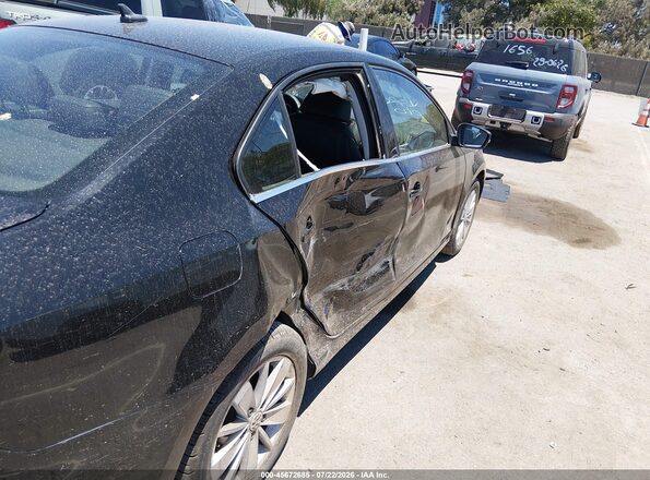 3VWD67AJ1GM259388 2016 VOLKSWAGEN JETTA Black Вид задньої частини салону