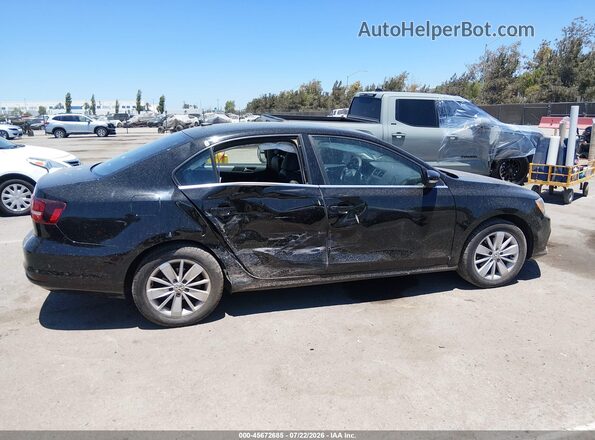 3VWD67AJ1GM259388 2016 VOLKSWAGEN JETTA Black 
