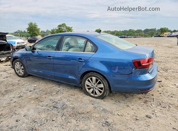 3VWD67AJ7GM341982 2016 VOLKSWAGEN JETTA Blue Trasero izquierdo