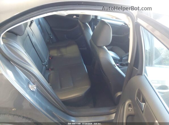 3VWD67AJ8GM378538 2016 VOLKSWAGEN JETTA Gray Widok naklejki z numerem VIN