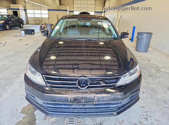 3VWDB7AJ0HM325104 2017 VOLKSWAGEN JETTA Black Вид спереду