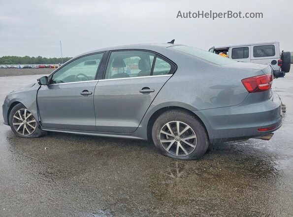 3VWDB7AJ4HM391980 2017 VOLKSWAGEN JETTA Silver Rear left
