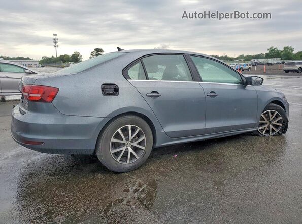 3VWDB7AJ4HM391980 2017 VOLKSWAGEN JETTA Silver Rear right