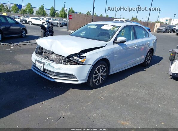 3VWDB7AJ4JM219325 2018 VOLKSWAGEN JETTA Silver Передня ліва чверть