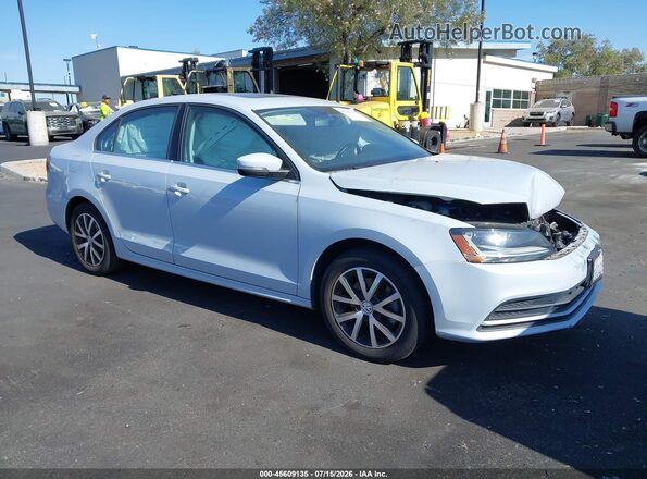 3VWDB7AJ4JM219325 2018 VOLKSWAGEN JETTA Silver Вид задньої частини салону