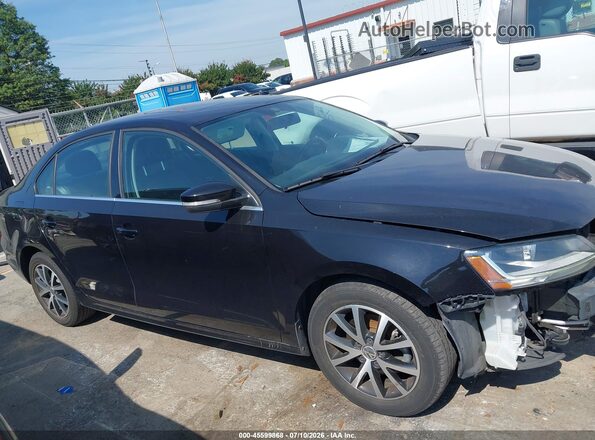 3VWDB7AJ5HM265840 2017 VOLKSWAGEN JETTA Black Widok wnętrza z tyłu