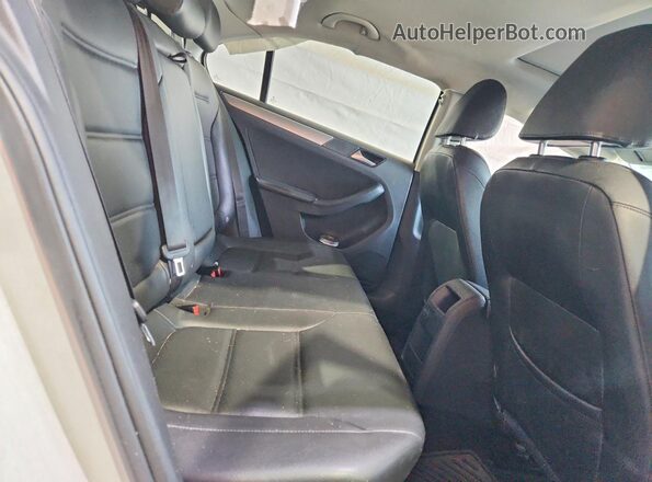 3VWDB7AJ6JM246977 2018 VOLKSWAGEN JETTA White Rear seats view