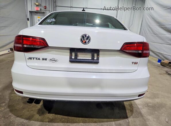 3VWDB7AJ6JM246977 2018 VOLKSWAGEN JETTA White Rear view