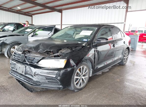 3VWDB7AJ9HM297657 2017 VOLKSWAGEN JETTA Black Widok z przodu