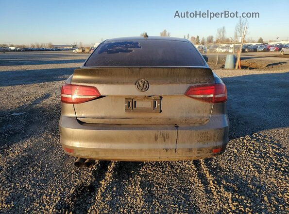 3VWDB7AJ9HM392736 2017 VOLKSWAGEN JETTA Gray Widok z tyłu