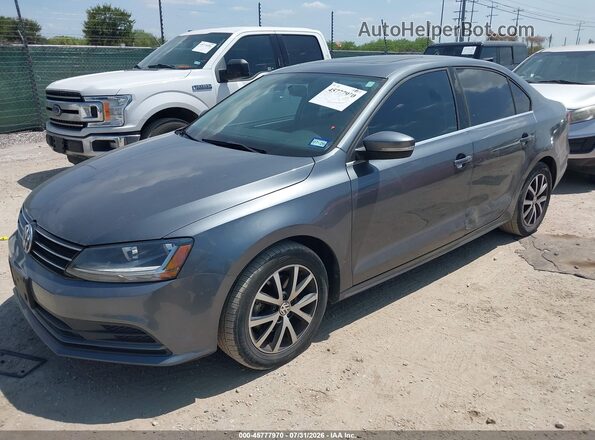 3VWDB7AJXHM371653 2017 VOLKSWAGEN JETTA Gray Front left