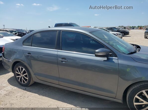 3VWDB7AJXHM371653 2017 VOLKSWAGEN JETTA Gray Rear interior view