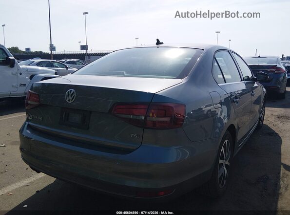 3VWDB7AJXJM233200 2018 VOLKSWAGEN JETTA Gray Trasero derecho