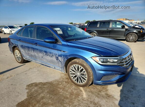 3VWE57BU2KM099711 2019 VOLKSWAGEN JETTA Синий Передняя правая четверть