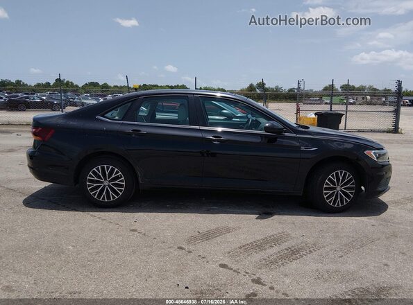 3VWEB7BU4KM243476 2019 VOLKSWAGEN JETTA Black Rear interior view