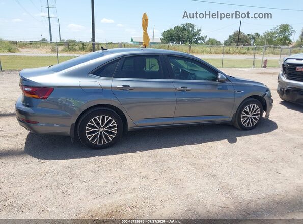 3VWEB7BUXKM125366 2019 VOLKSWAGEN JETTA Gray Rear interior view