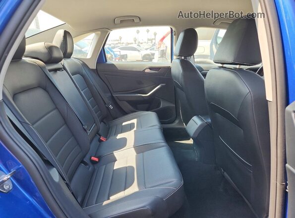3VWEM7BU5RM033490 2024 VOLKSWAGEN JETTA Blue Vista de los asientos traseros
