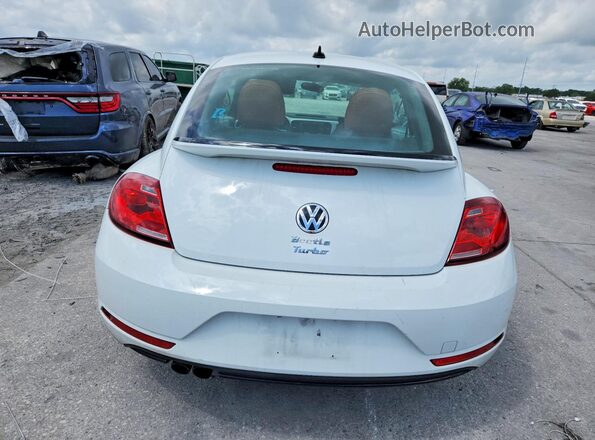 3VWF17AT0HM624752 2017 VOLKSWAGEN BEETLE White Rear view