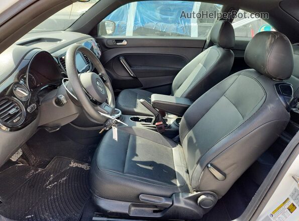 3VWF17AT1HM618894 2017 VOLKSWAGEN BEETLE Белый Вид салона спереди