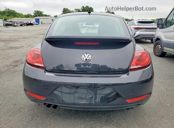 3VWF17AT6HM613142 2017 VOLKSWAGEN BEETLE Черный Вид сзади
