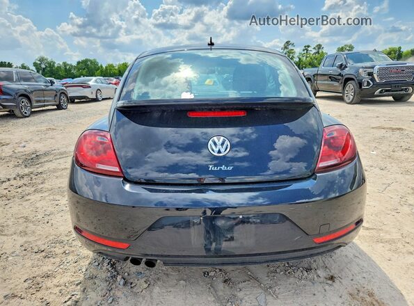 3VWFD7AT9KM707708 2019 VOLKSWAGEN BEETLE Черный Вид сзади