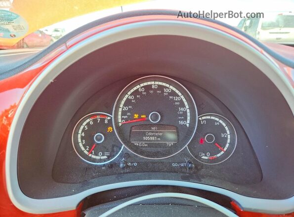 3VWJ17AT2GM615348 2016 VOLKSWAGEN BEETLE Оранжевый Вид щитка приборов