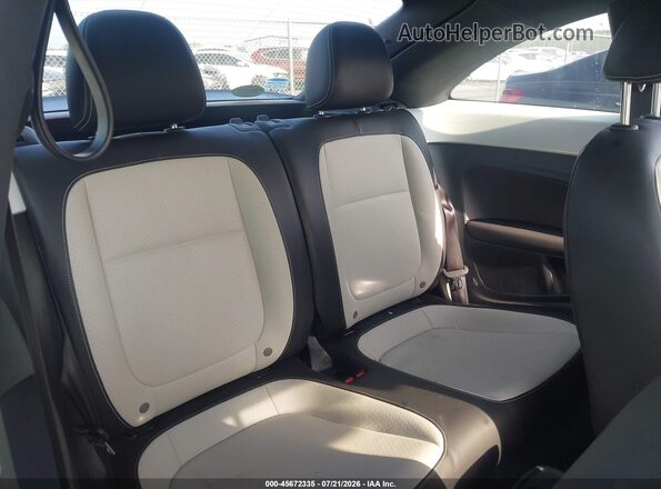 3VWJ17AT7HM617260 2017 VOLKSWAGEN BEETLE White Widok naklejki z numerem VIN