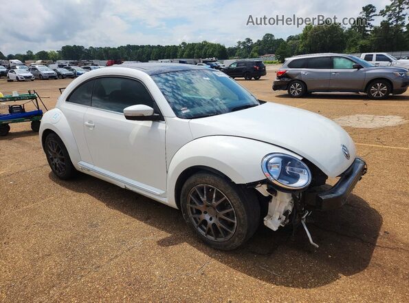 3VWJD7AT4JM710556 2018 VOLKSWAGEN BEETLE Белый Передняя правая четверть
