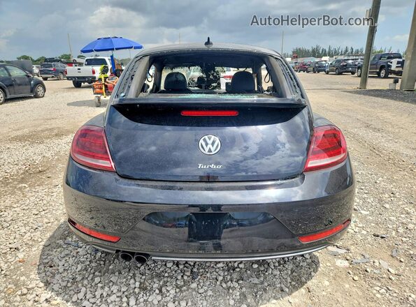 3VWJD7AT6KM713072 2019 VOLKSWAGEN BEETLE Black უკანა ხედი