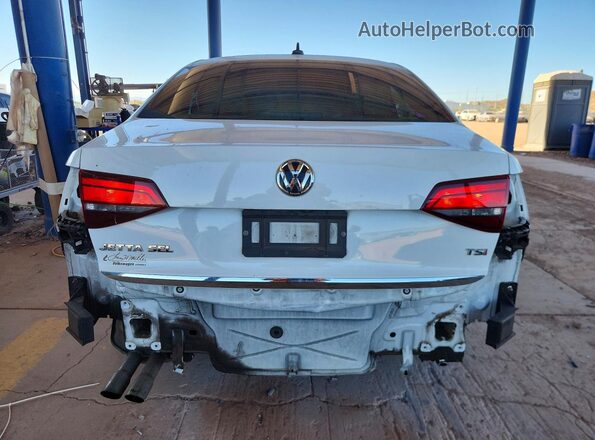 3VWL17AJ4HM390729 2017 VOLKSWAGEN JETTA White Rear view