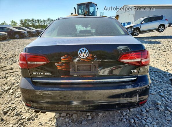 3VWL17AJ5HM215809 2017 VOLKSWAGEN JETTA Черный Вид сзади